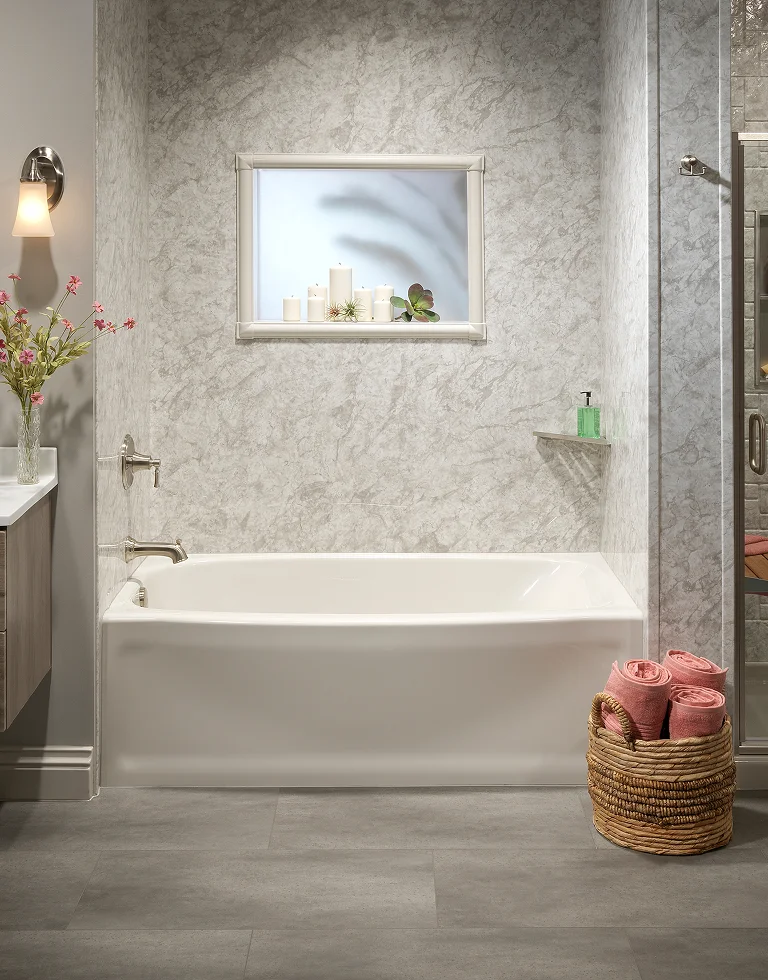 Glass shower enclosure with coordinated bathroom fixtures